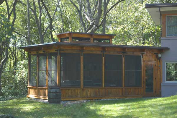Three-season room constructed using reclaimed wood supplied by MichiganBarnworks