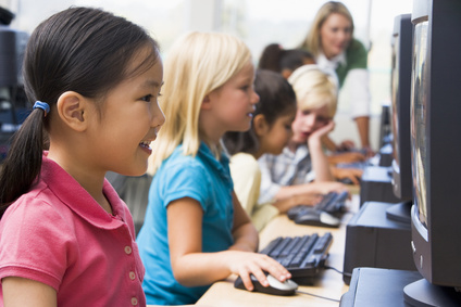 Kids in school on computers